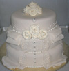 Resplendent Wedding cake with fondant furls and much embellishment